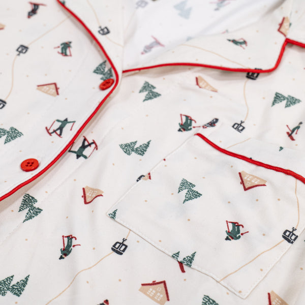 Jersey Pyjamas til Damer - Skiscene Fabric Close-up Image